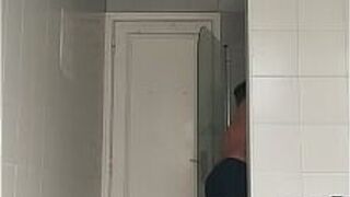 Sexy guy in black beach shorts shaving porn video